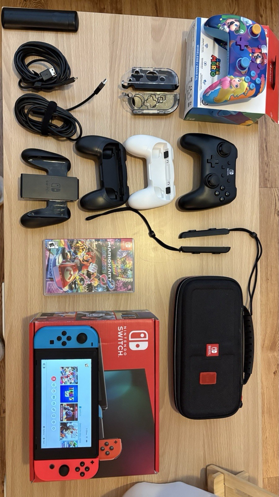 Nintendo Switch with Blue and Red Joy-Con Controllers and Mario Kart 8 – Black