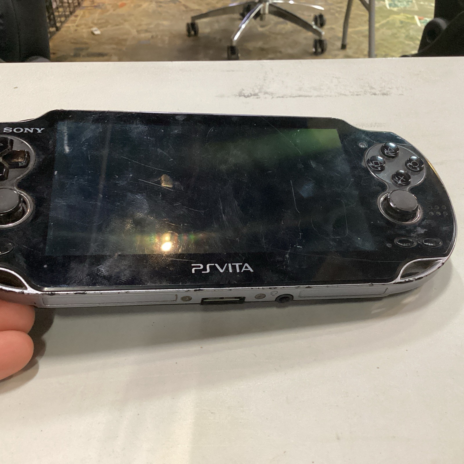 Sony PlayStation Vita PCH-1001 Black Handheld System With Cards And A Carry Case