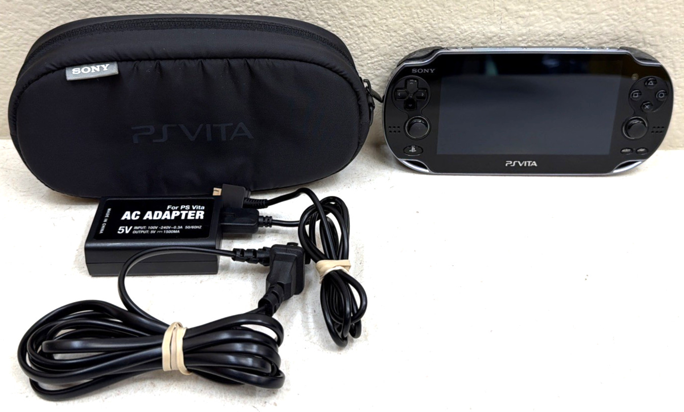 Sony PlayStation Vita Black PCH-1001 OLED With Original Charger and Case