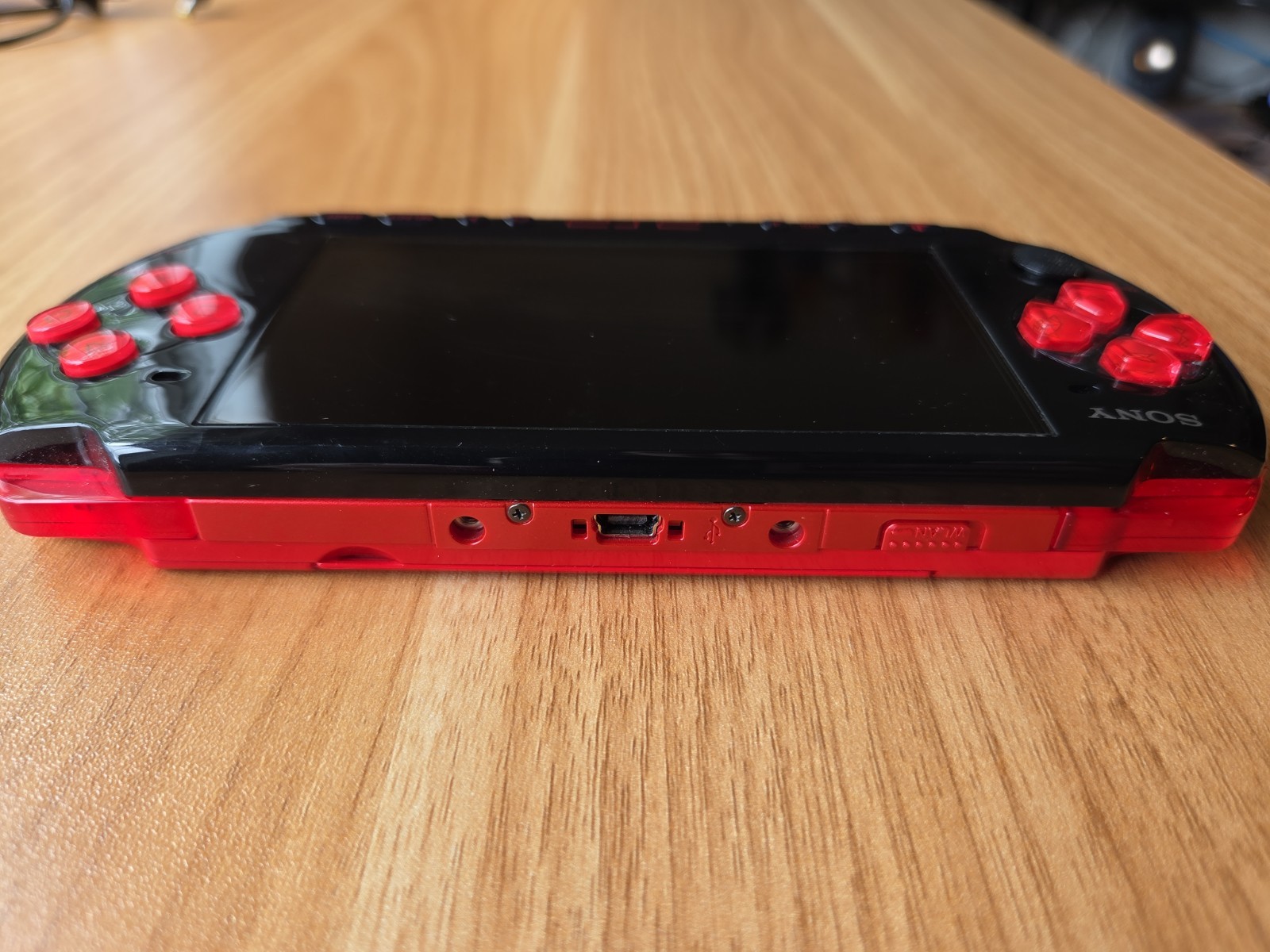 Sony PSP 3000 Console Black / Red – Good Condition + Charger