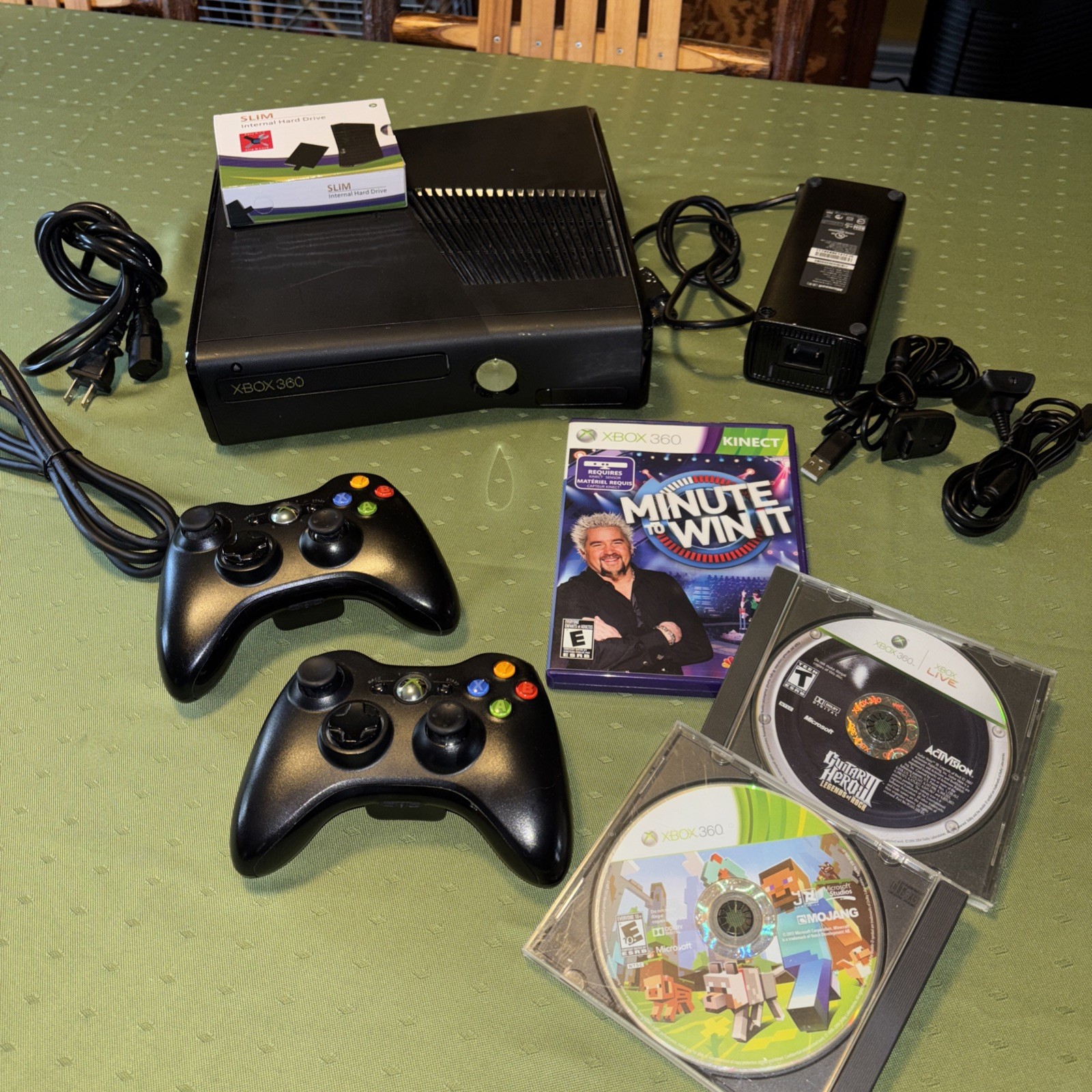 Xbox 360 with new 500 GB install installed two controllers & three games. Tested