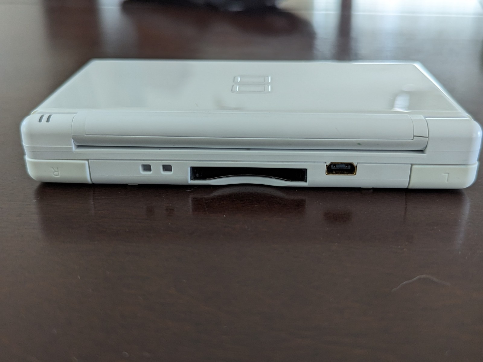 Nintendo DS Lite with Charger, Hard Case, soft case, 15 games in cases.