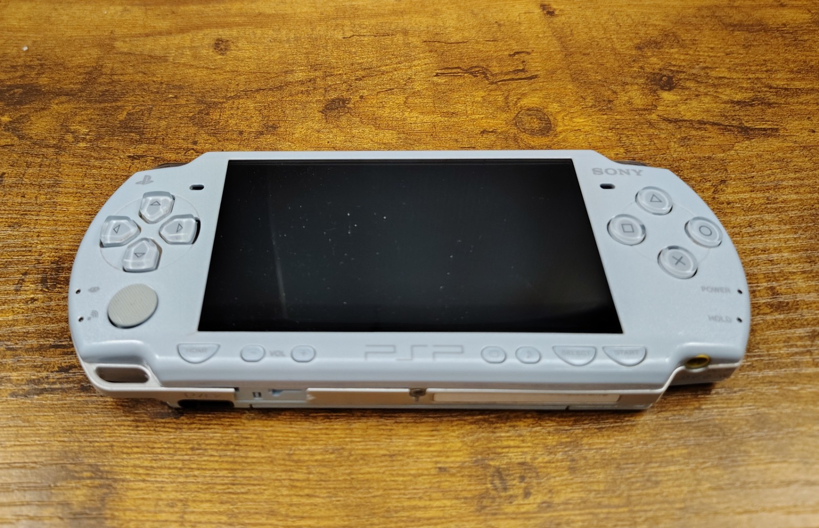 SILVER Sony PSP 2000 System Bundle With Games, Movies, And Cases