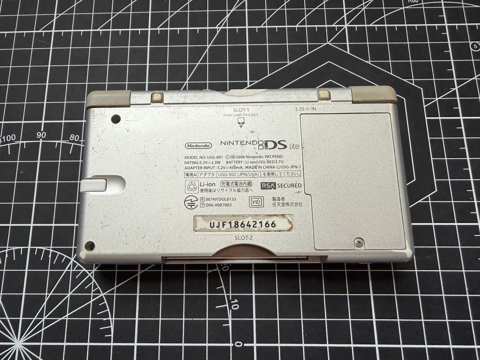 Nintendo DS Lite Used OEM Silver W/ R4 & 2GB SD – 100% Tested Region Free