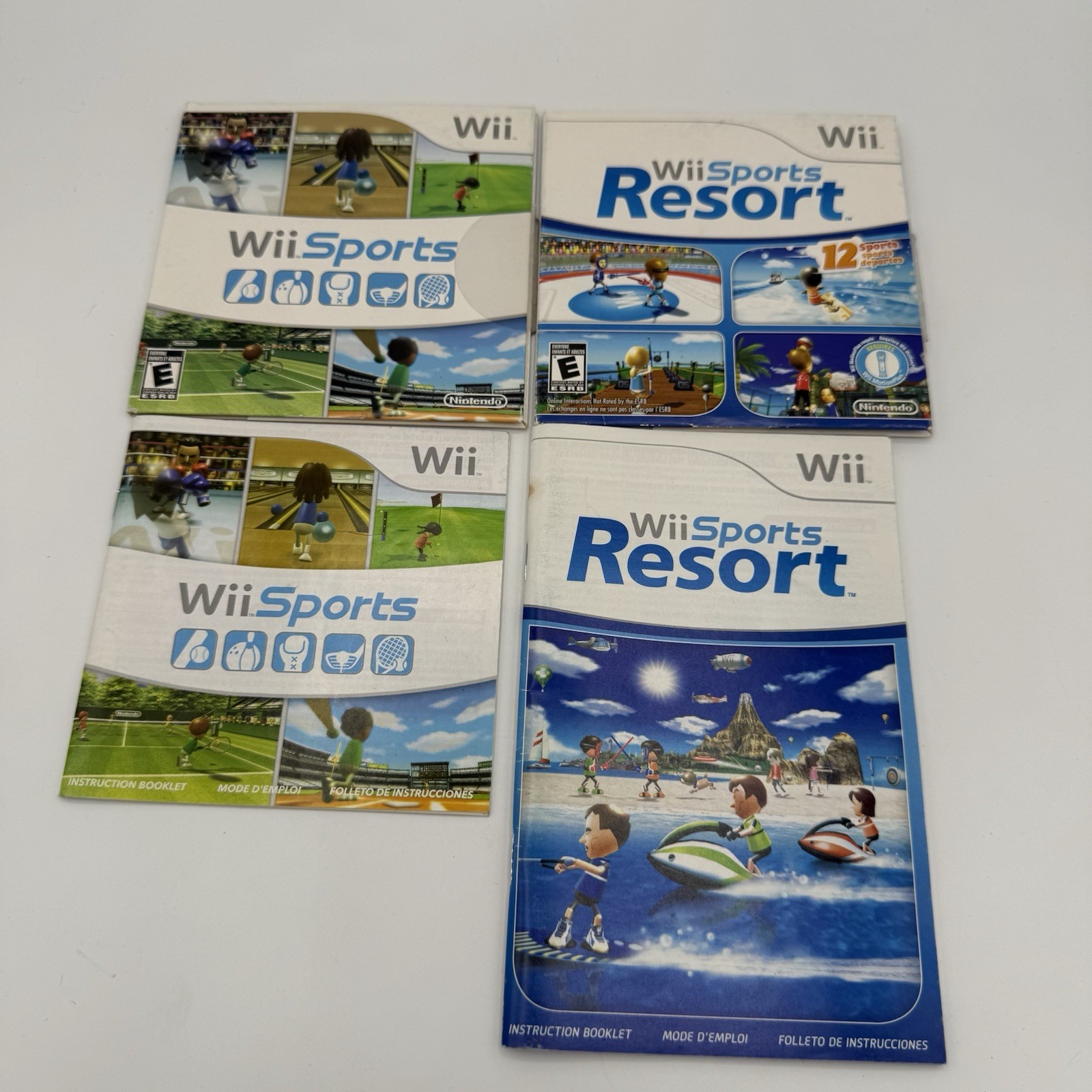 Nintendo Wii Black Console RVL-001 Wii Sports + Resort w/ 2 Wiimotes + 5 Games