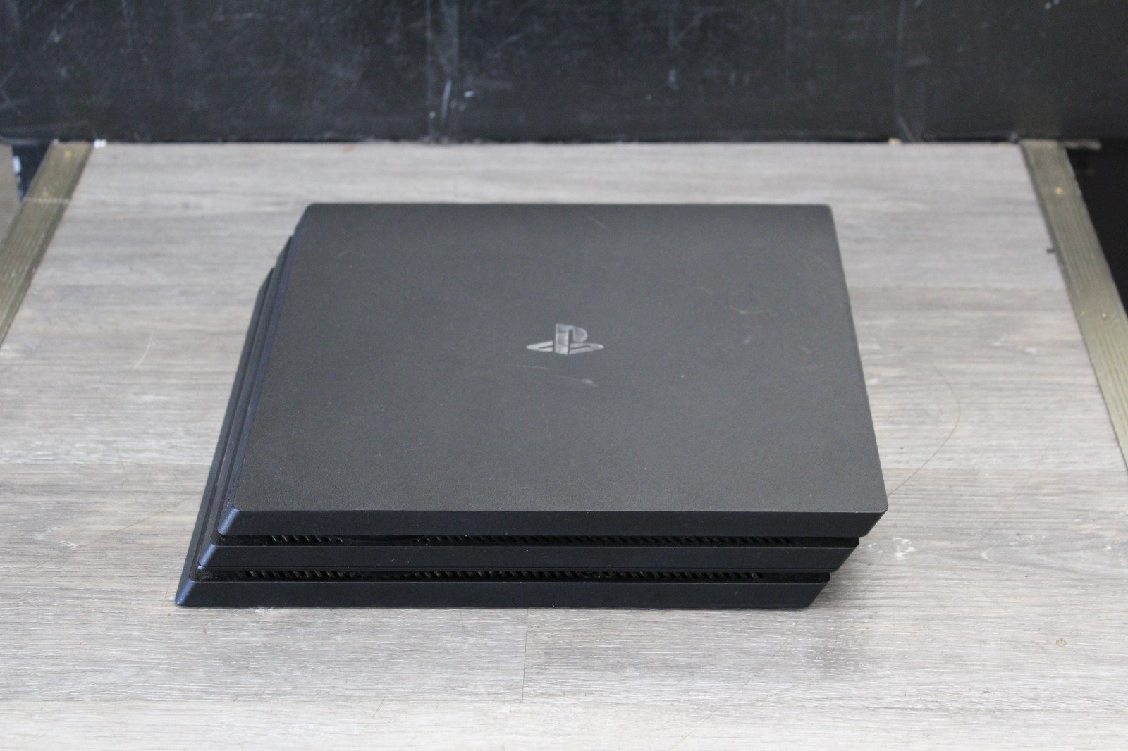 Sony PlayStation 4 Pro 1TB Game Console – Jet Black with Camo Controller