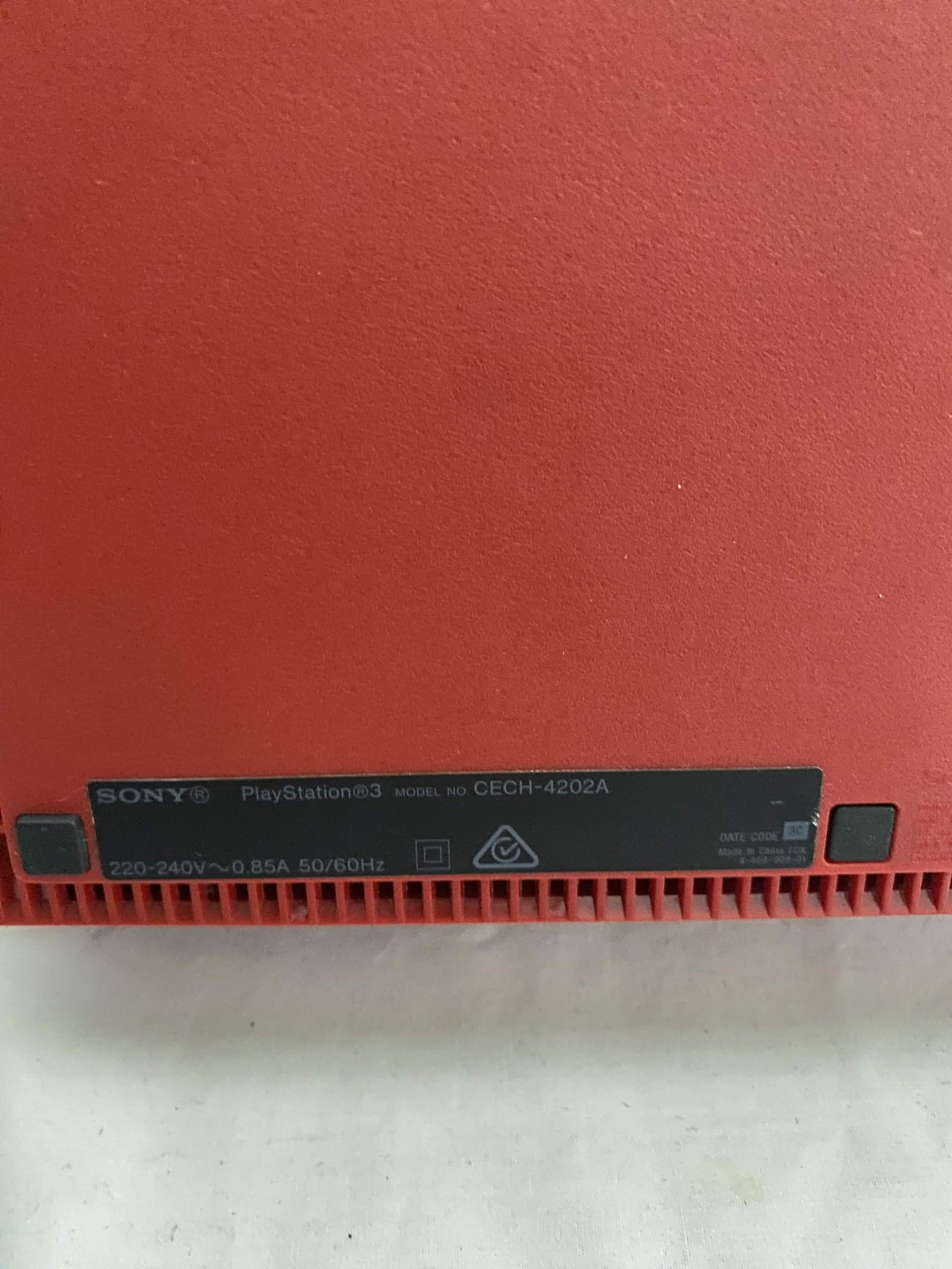 PlayStation 3 Red Super Slim Console CECH-4202A 12GB with 6 games & 2 controller