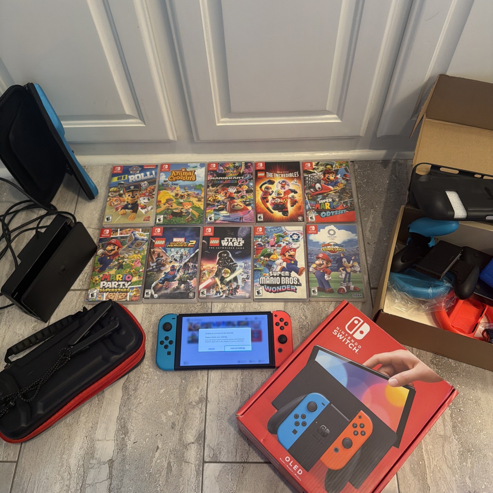 Nintendo Switch OLED BUNDLE 64GB 10 games w 5 Mario games & Comes w/ attachments