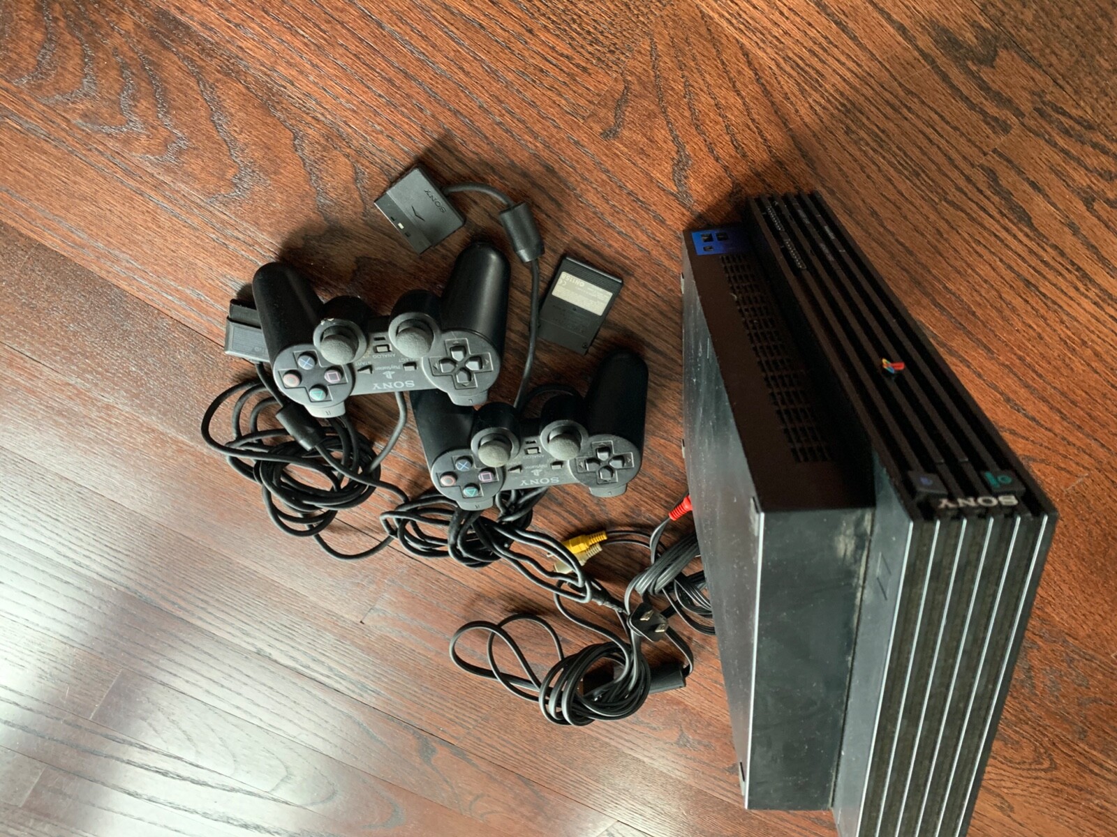 Sony PlayStation 2 Console – Black (SCPH-39001) – 2 remote and 8MB memory card
