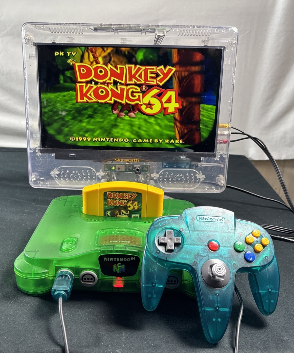 Nintendo 64 (N64) Console – Jungle Green W/ Blue Controller, Expansion & DK64