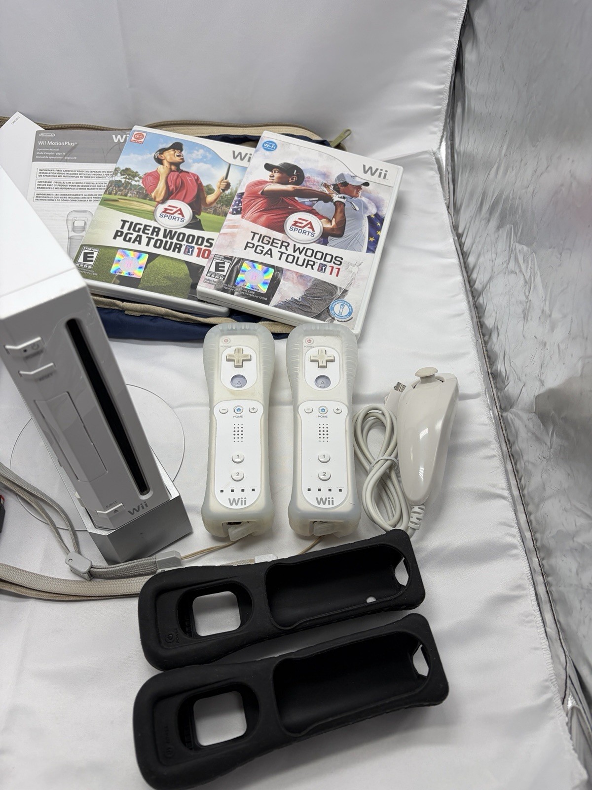 Nintendo Wii Console Bundle – 2 Controllers, Nunchuck, Power/AV Cords + 2 Games