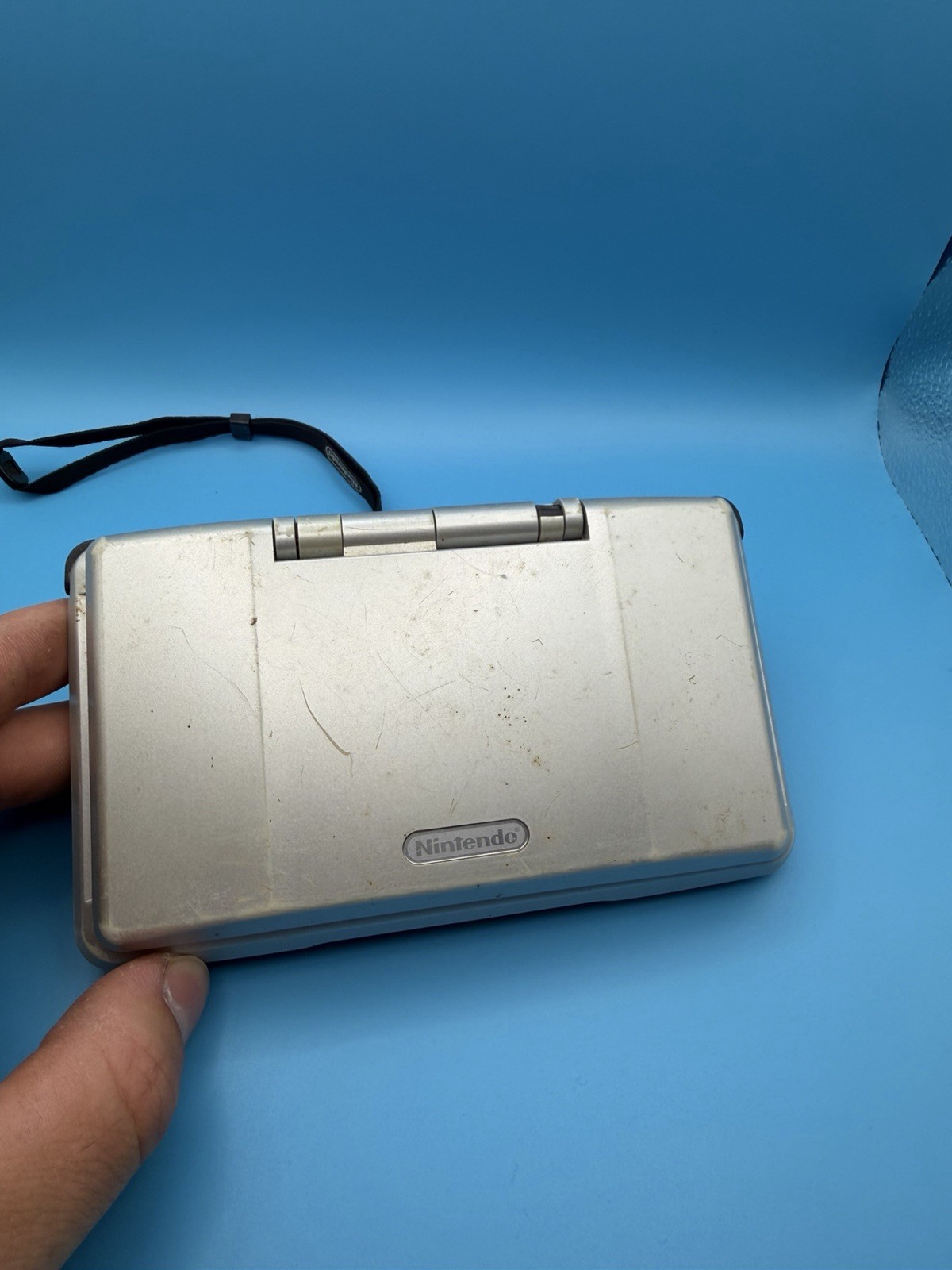 Nintendo DS Titanium Game Console Handheld Tested Cracked Shell