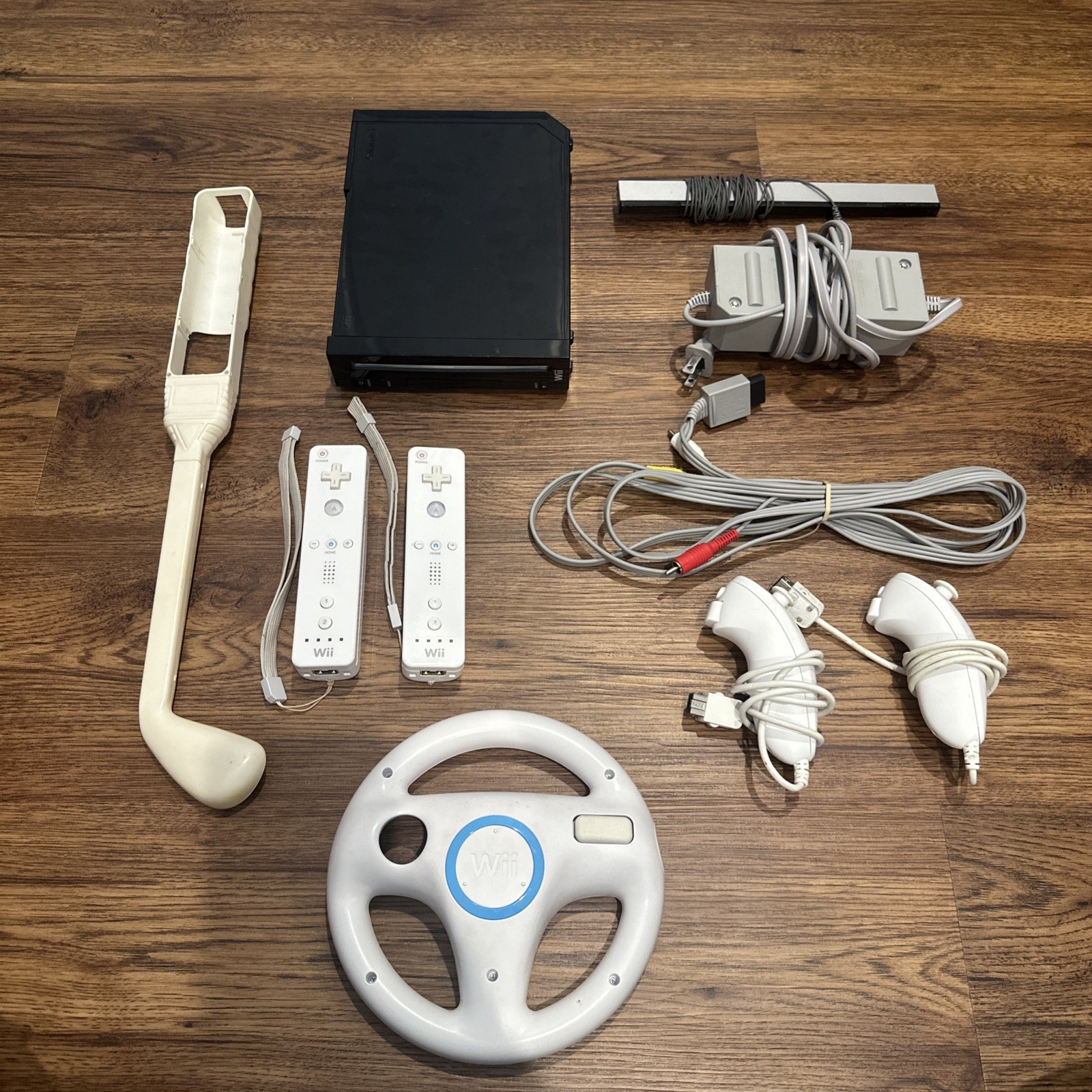 Nintendo Wii Video Game BLACK CONSOLE, 2 REMOTES, WHEEL + ACCESSORIES