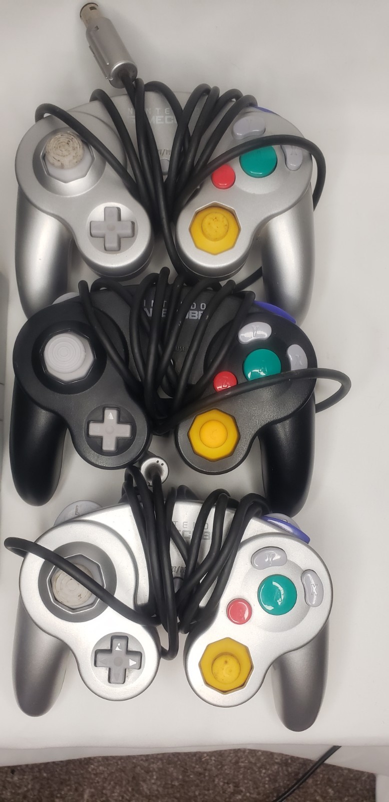 GameCube with 3 remotes, 2 games, cords, and remotes!
