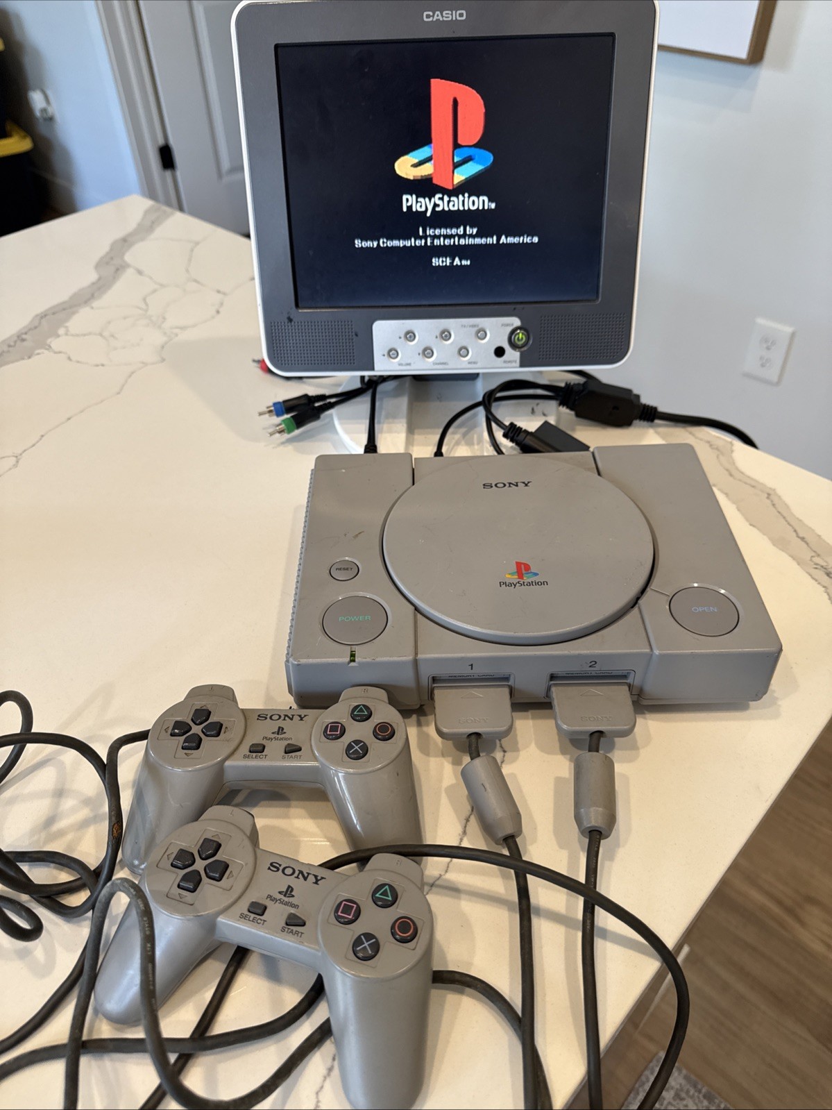 PlayStation 1 SCPH-7501 Console & Controllers. Works. Has Some Cosmetic Defects.