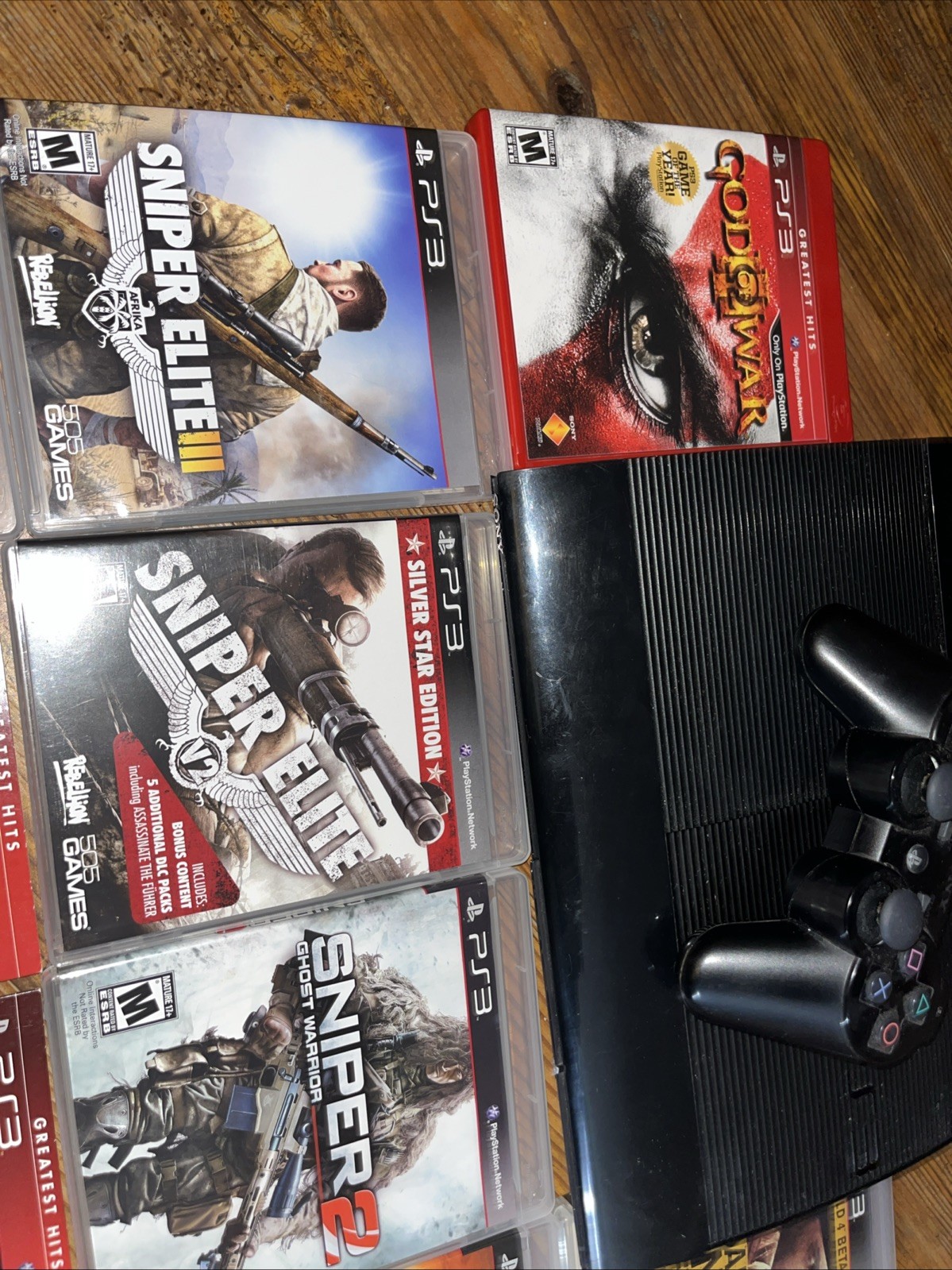 Sony PlayStation 3 Super Slim CECH-4001B 250GB Black Games Controller Bundle
