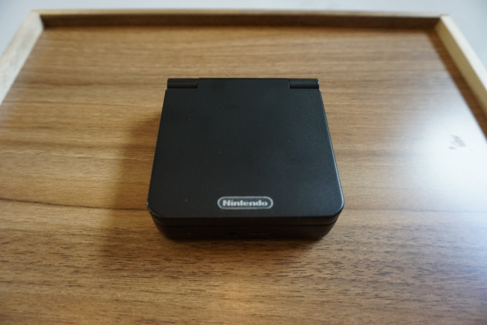 Black Miyoo Flip V2 Retro Handheld with Nostalgic Decals