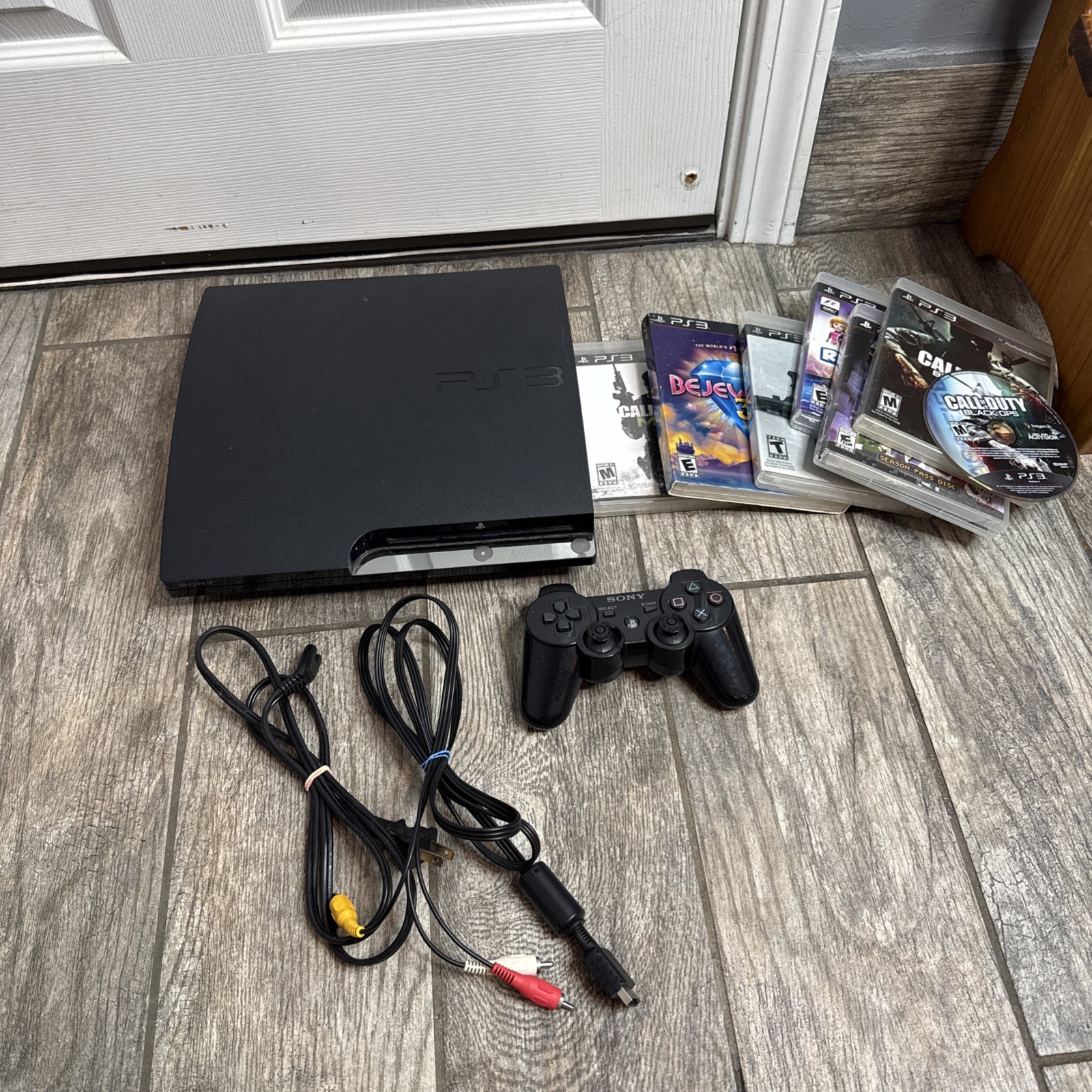 Sony PlayStation 3 Slim 160GB Console CECH-2501A 7 games included