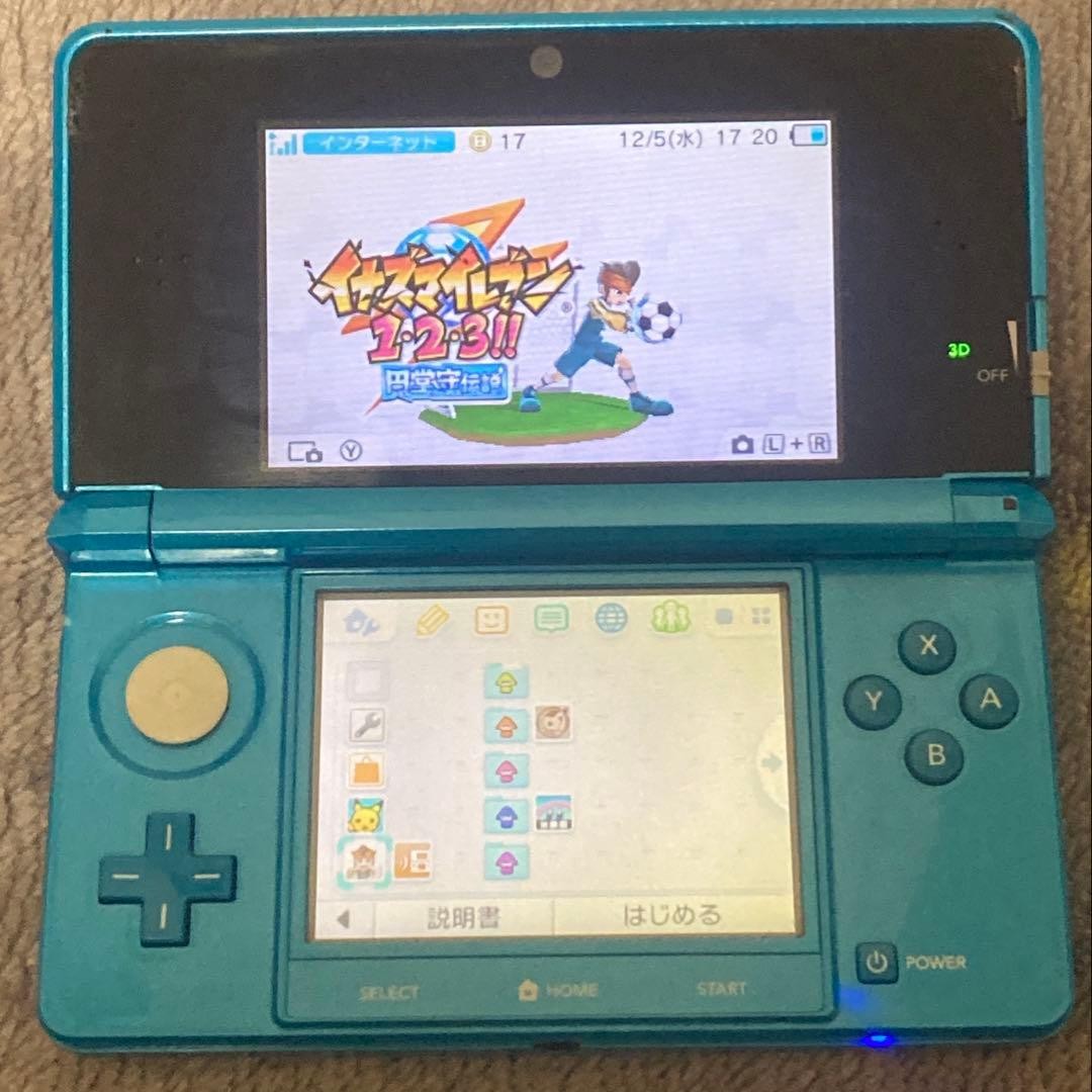 Nintendo 3DS Light Blue console with box charger and games (including Legend of