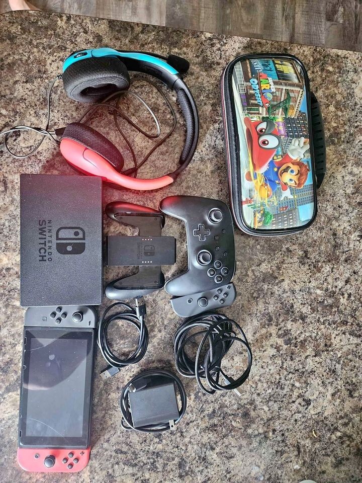 Used Nintendo Switch red and grey controller bundle