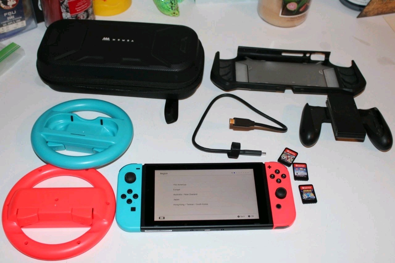 Nintendo Switch Console Model HAC-001(01) Bundle w/ 3 Games, Carrying Case, Extr