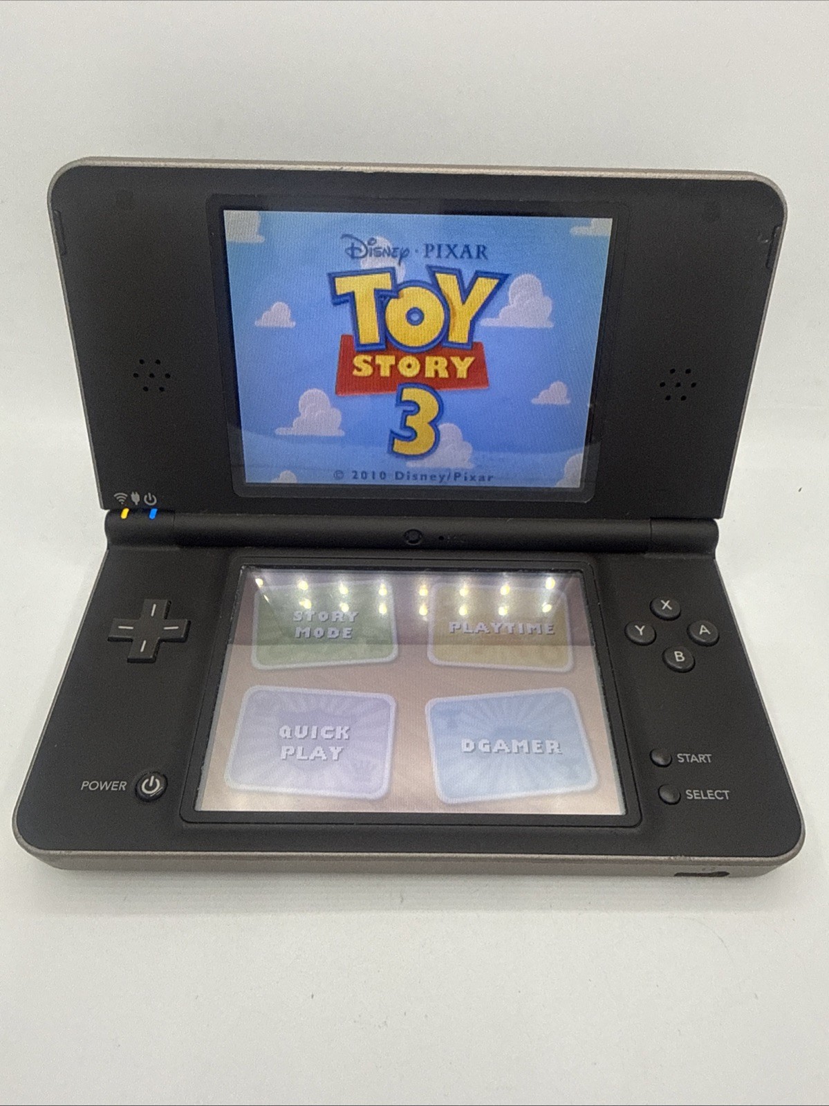 Nintendo DSI XL Handheld Console Bronze UTL-001 Bundle 8 Games, Charger, Stylus