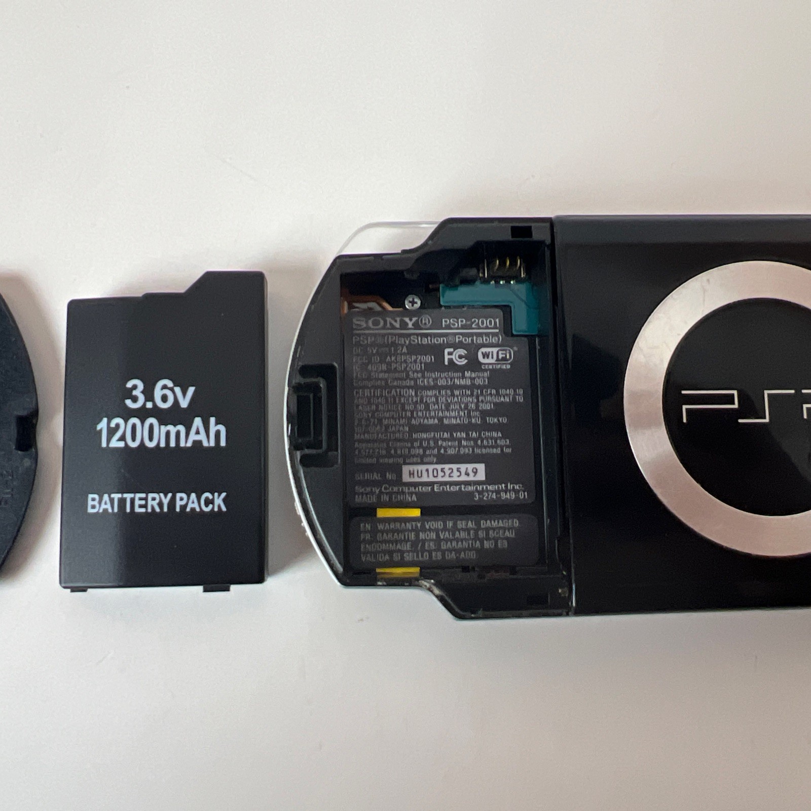 Sony PSP 2001 handheld console -Tested Has Issues Registering Games Parts/repair