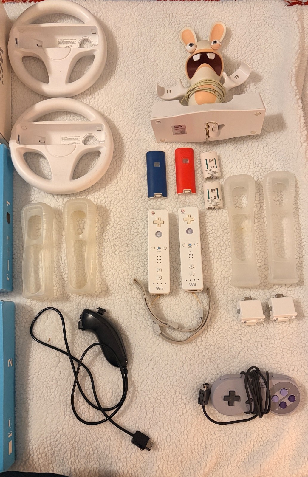 Nintendo wii with box and instructions, 15 games, rabbids charger plus more