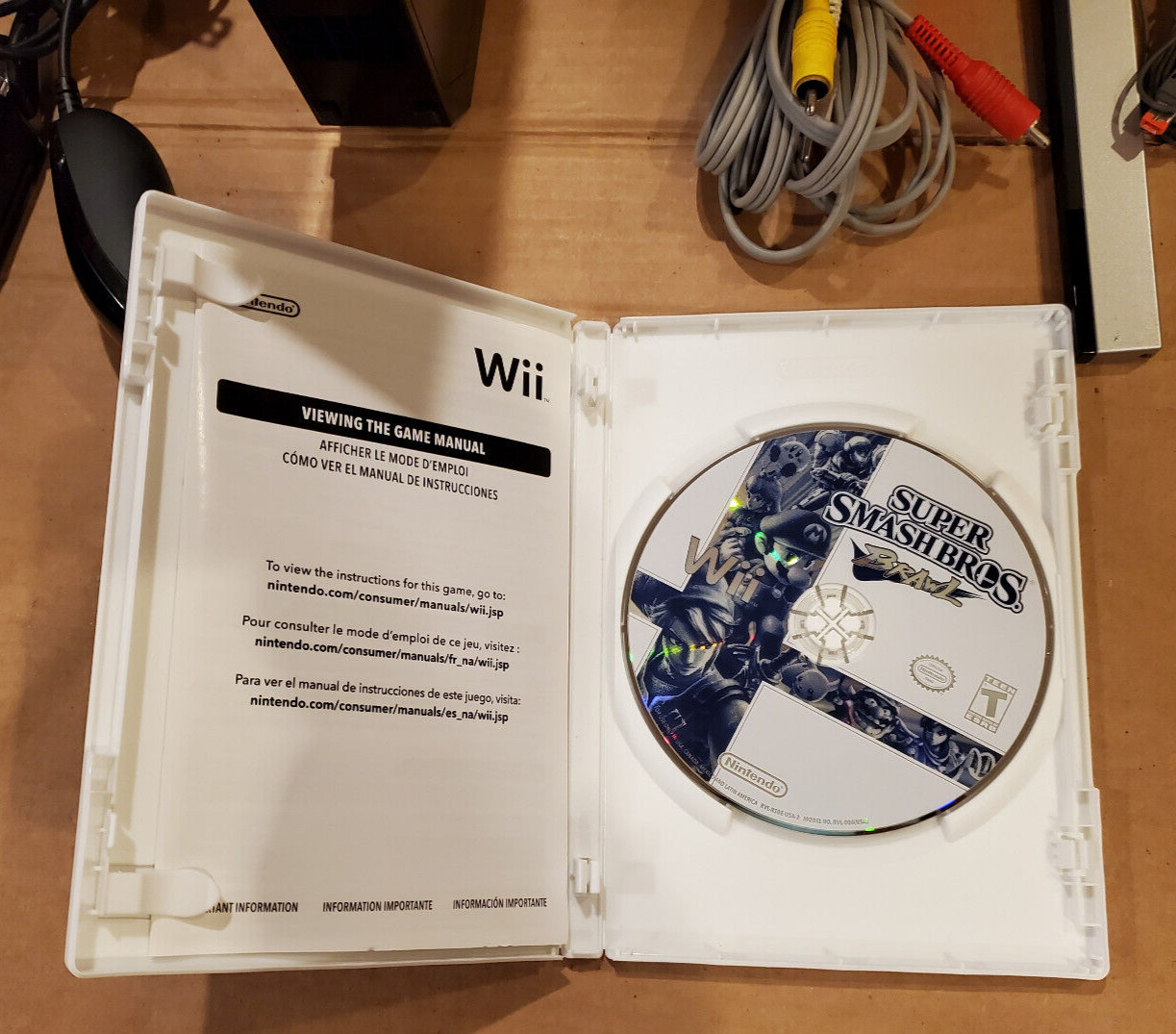 Nintendo Wii Console in Black, Gamecube Compatible + super smash bros brawl game