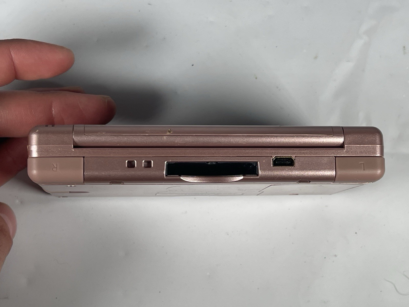 Nintendo DS Lite Metallic Rose Pink Handheld Console with Games