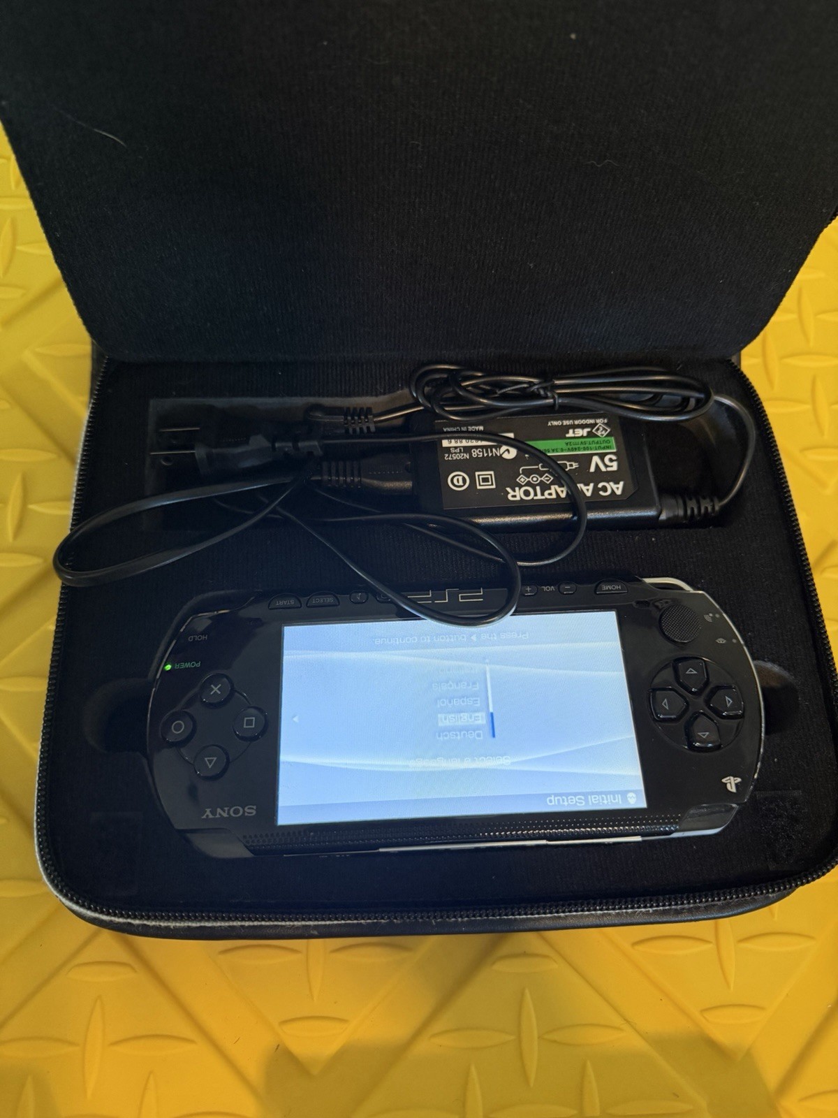 Sony PSP Black Handheld System Bundle w/ Case & Charger, Wi‑Fi, Headphone Jack