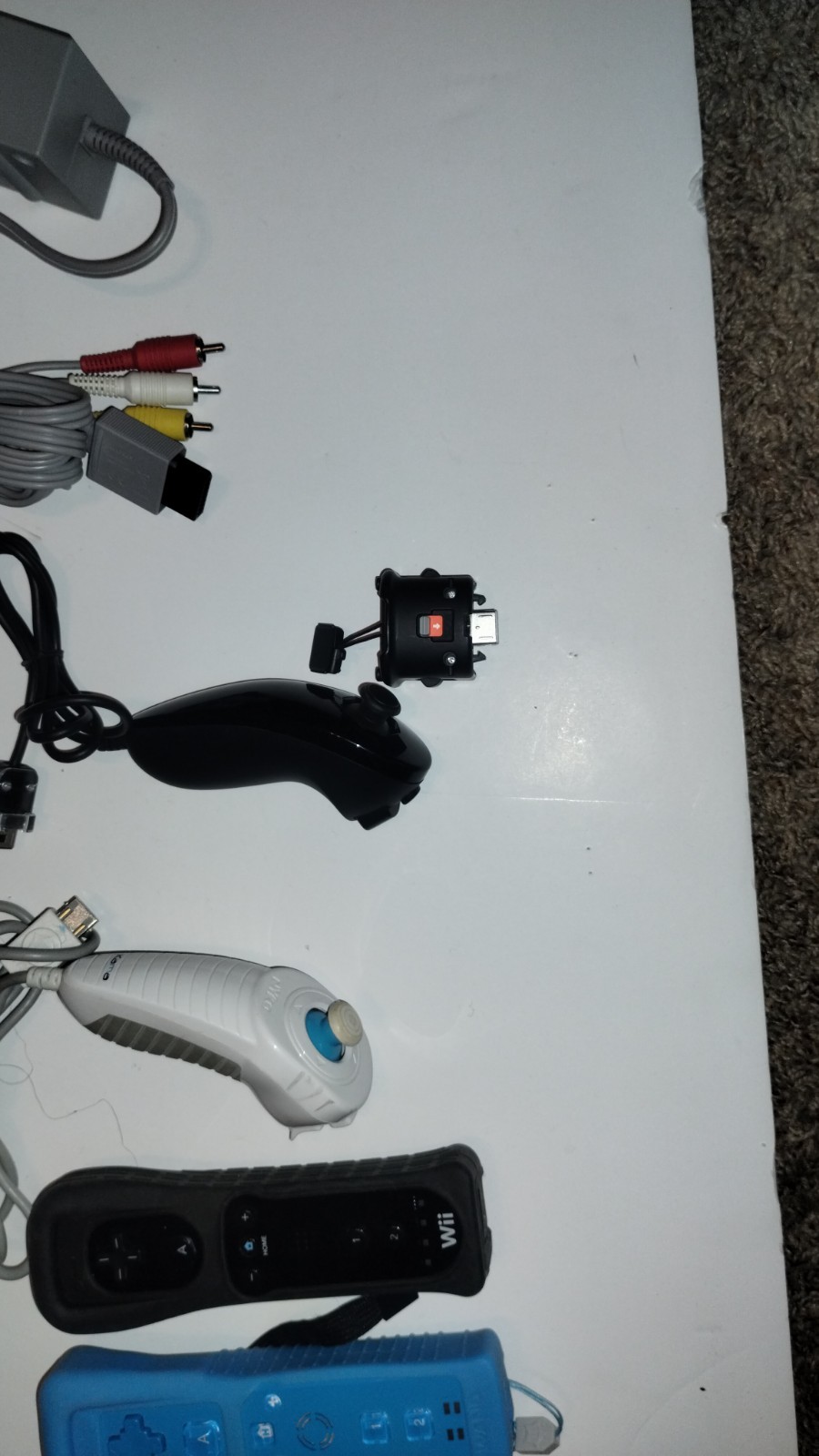 Nintendo Wii Console Bundle with Two Remotes & 3 Games And Wii Fit Board