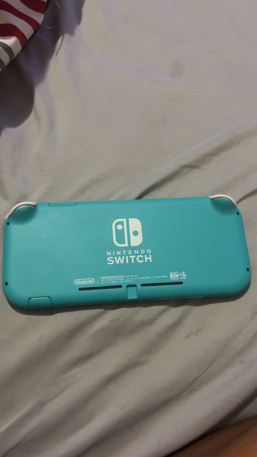 Nintendo Switch Lite Turquoise Handheld Console Wi-Fi Capability Headphone Jack