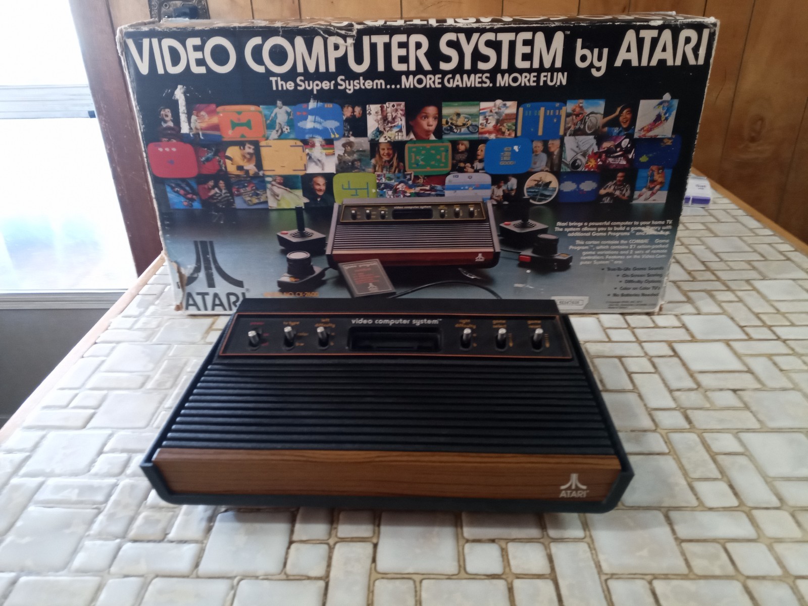 Atari 2600 light 6er In Box -Comes w/ paddles/joysticks, CIB works decent con