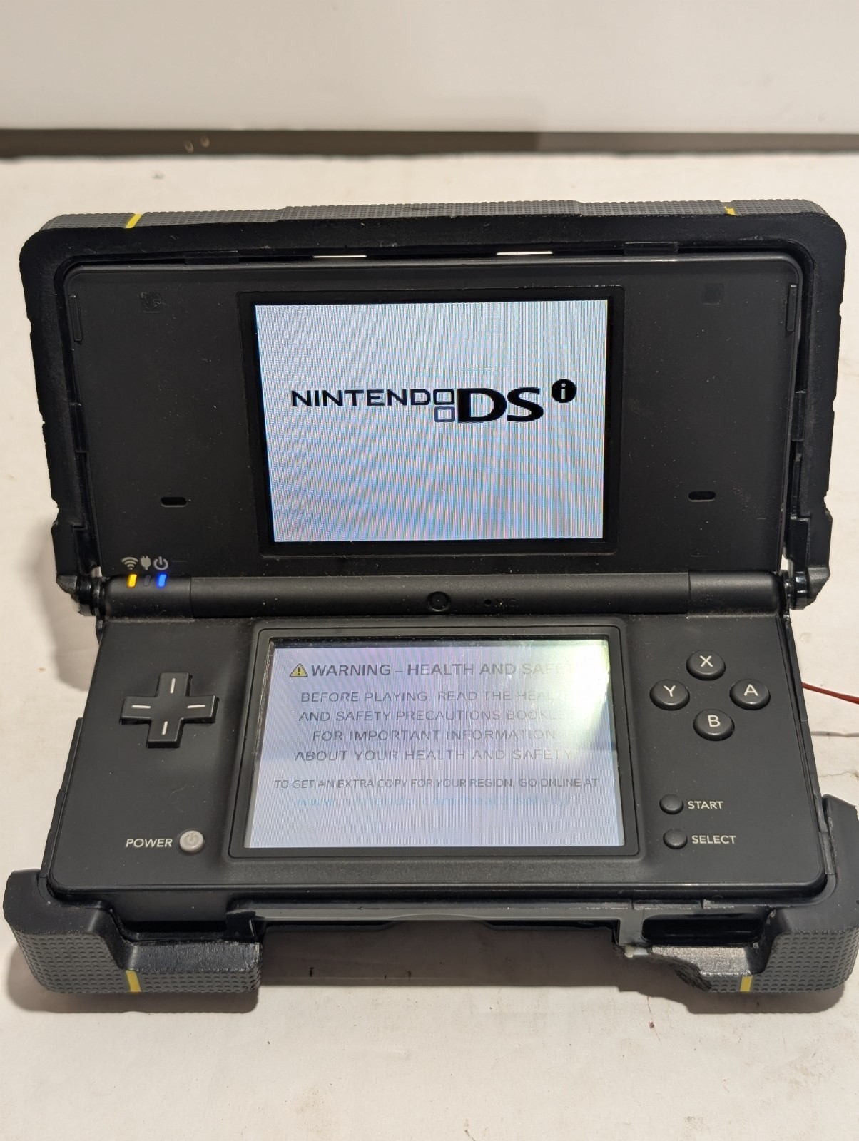 Nintendo DSi Bundle (DSi + NERF Case + Charger + Stylus + Game)