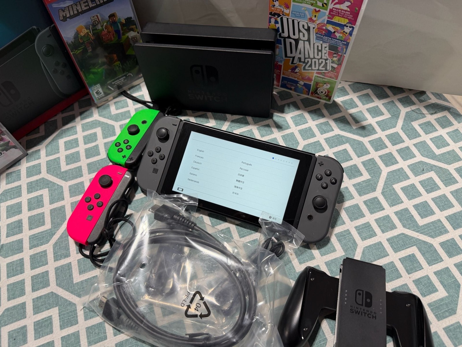 Nintendo Switch Console. + Super Smash Brothers, Minecraft and Just Dance 2021