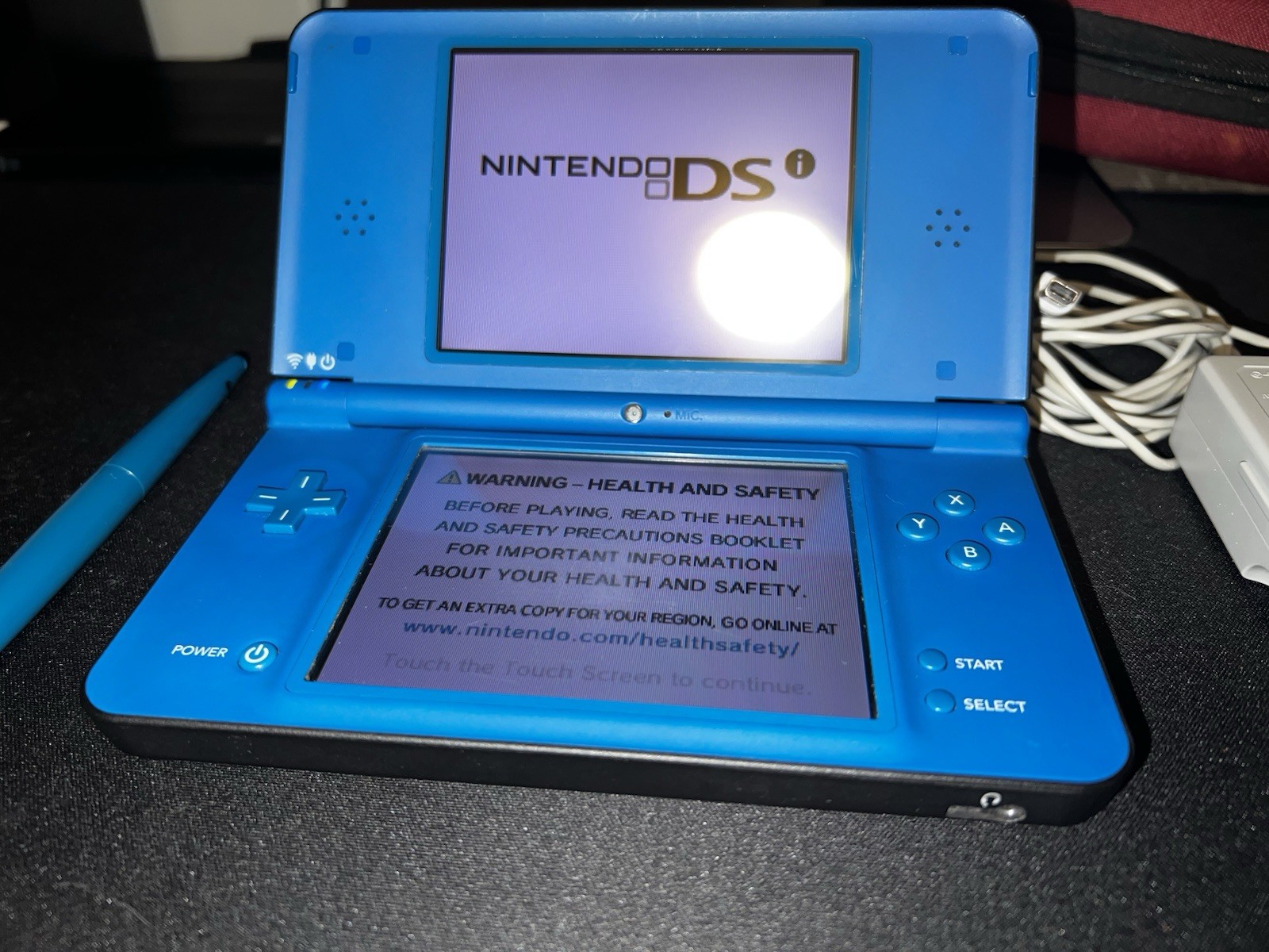 Nintendo DSi XL Handheld System – Midnight Blue w/ 7 games Bundle.