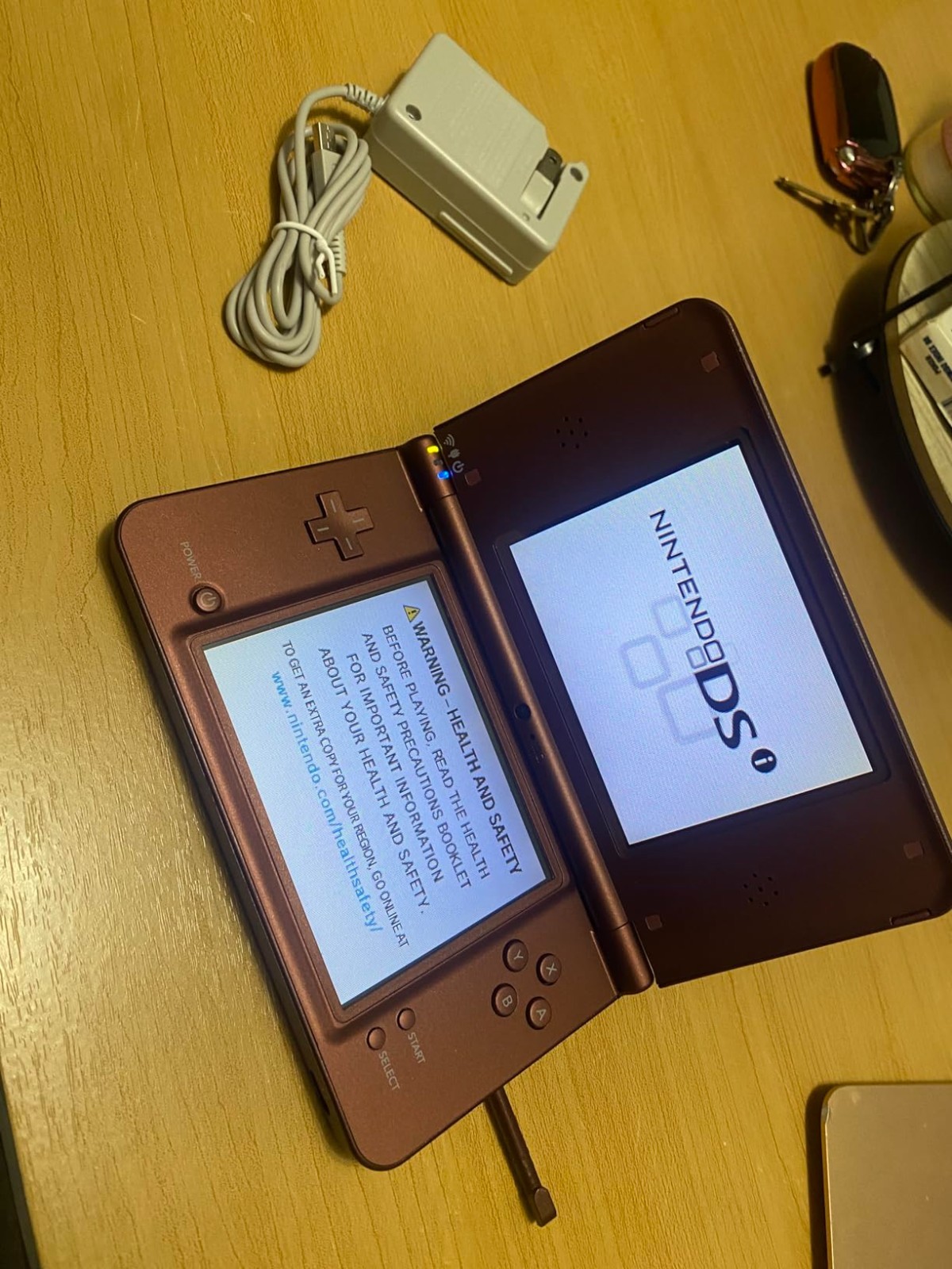 Nintendo DSi XL Launch Edition 256MB Handheld System – Burgundy