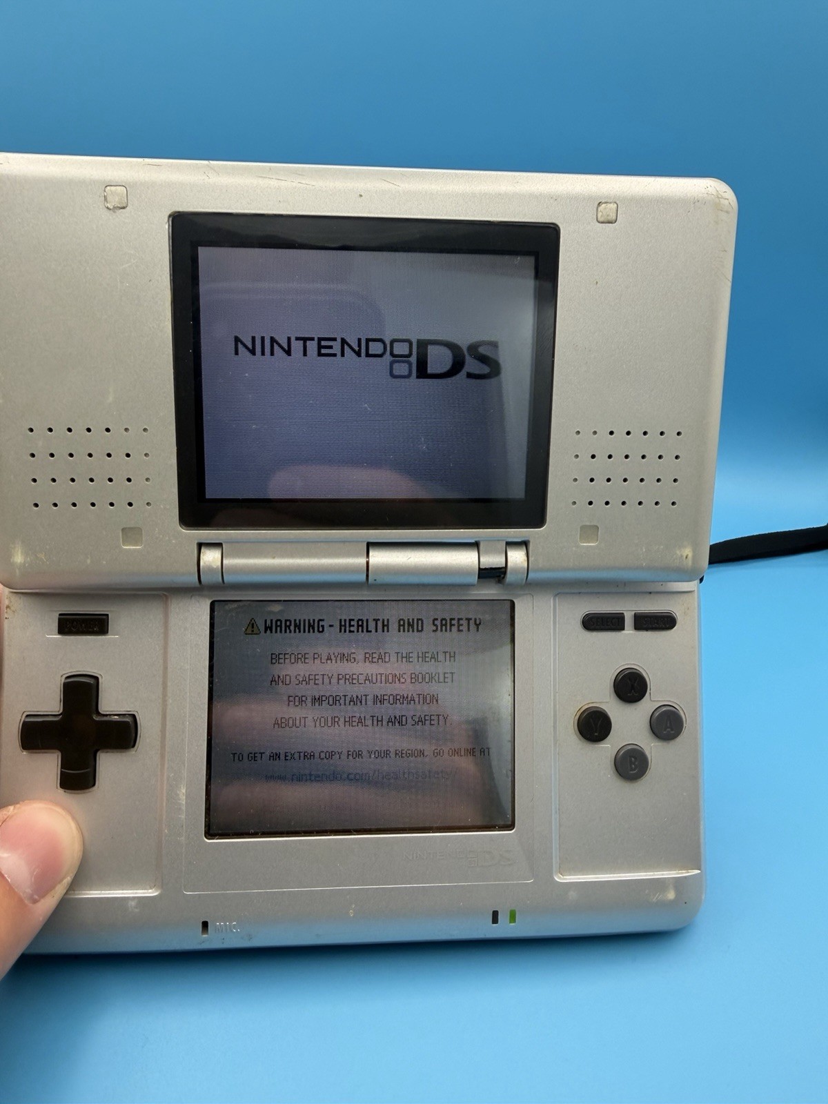 Nintendo DS Titanium Game Console Handheld Tested Cracked Shell
