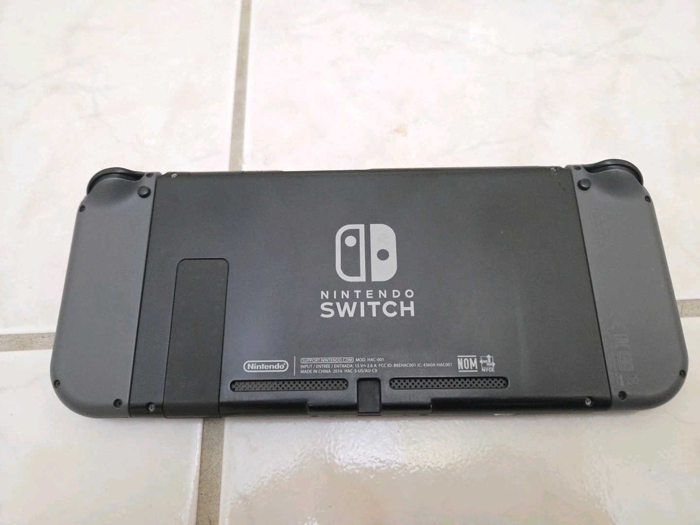 Nintendo Switch HAC-001 + Power Cable, Dock, Nitro Deck, & 256 GB Micro SD