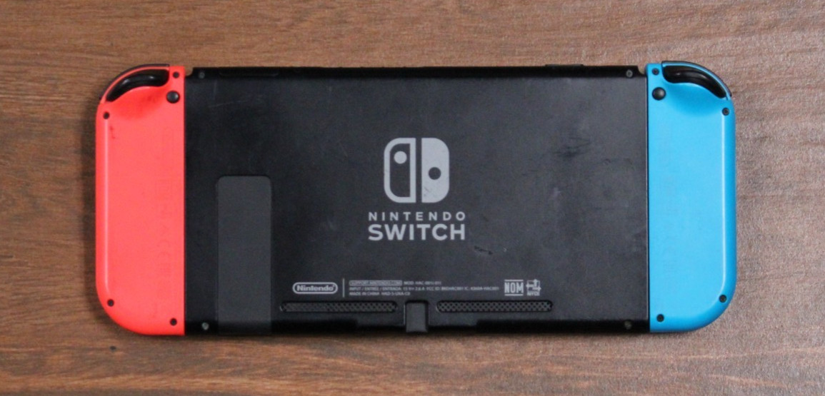 (RI3) Nintendo Switch 32GB Handheld Console – Neon Red/Neon Blue (Console Only)