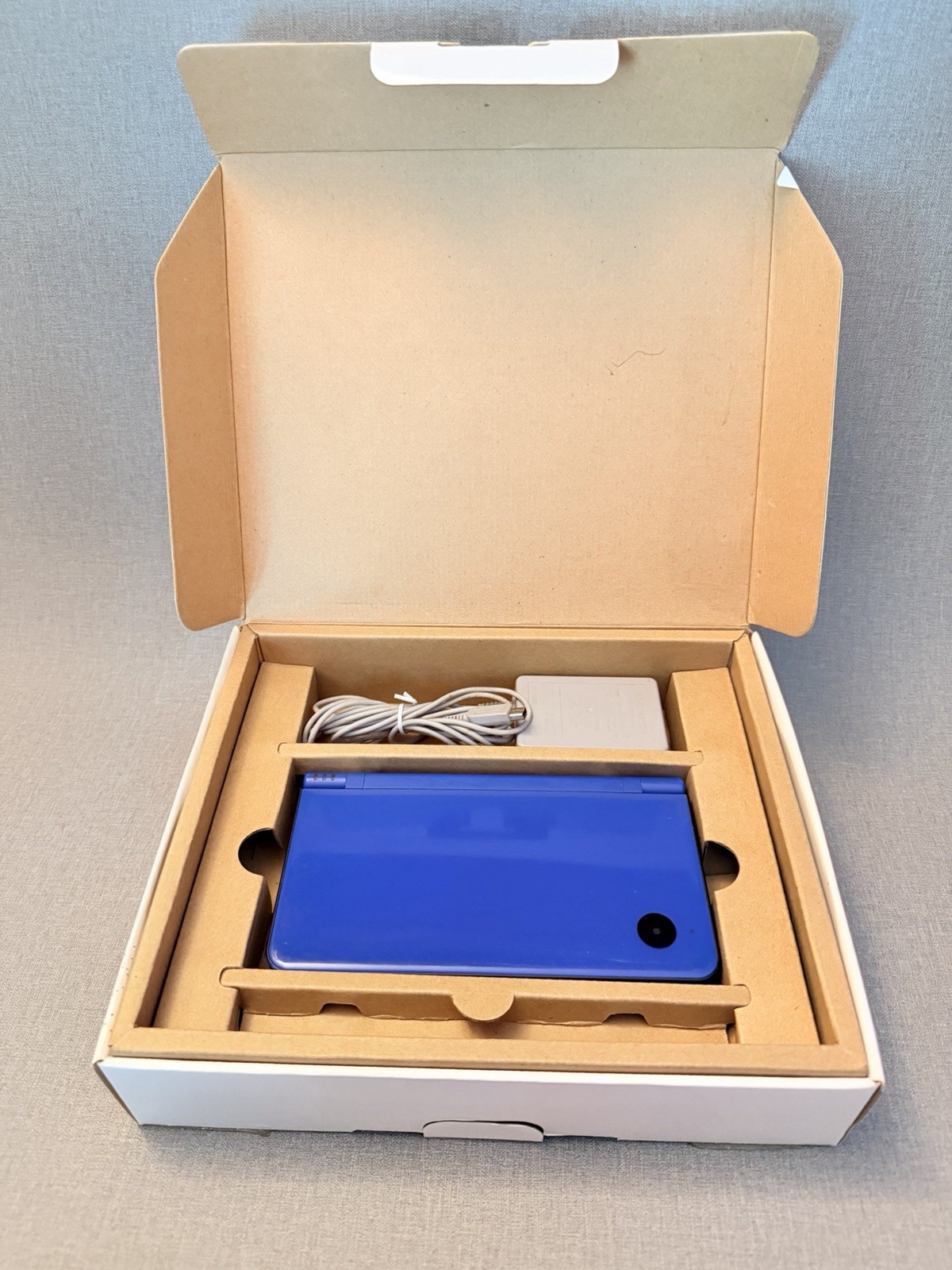 Nintendo DSi XL Blue Handheld Console Complete w/ White Stylus Tested