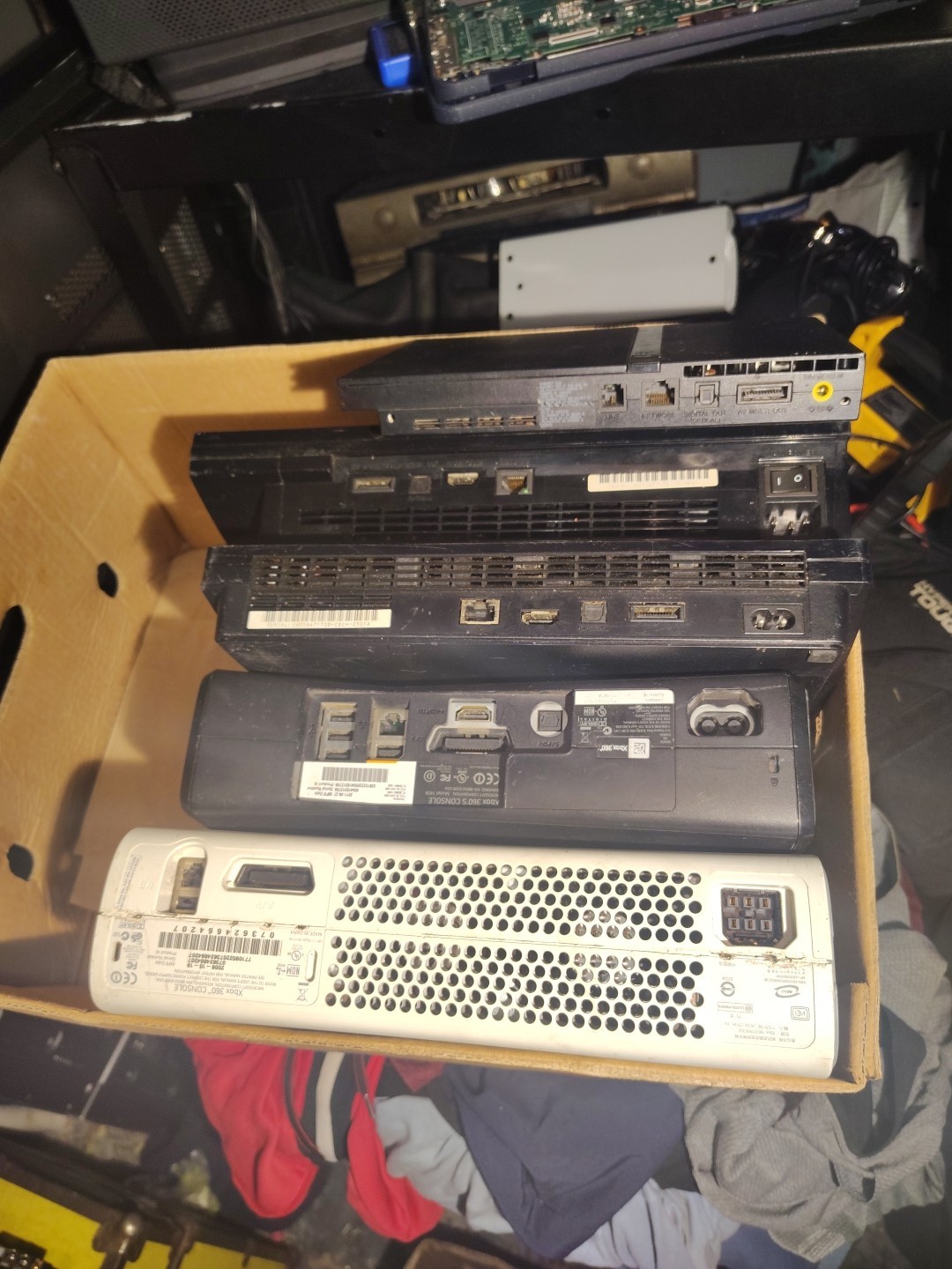 A PS2 To PS3s One Appears To Be A Pro . Two Xbox 360s Later Model & Early Model
