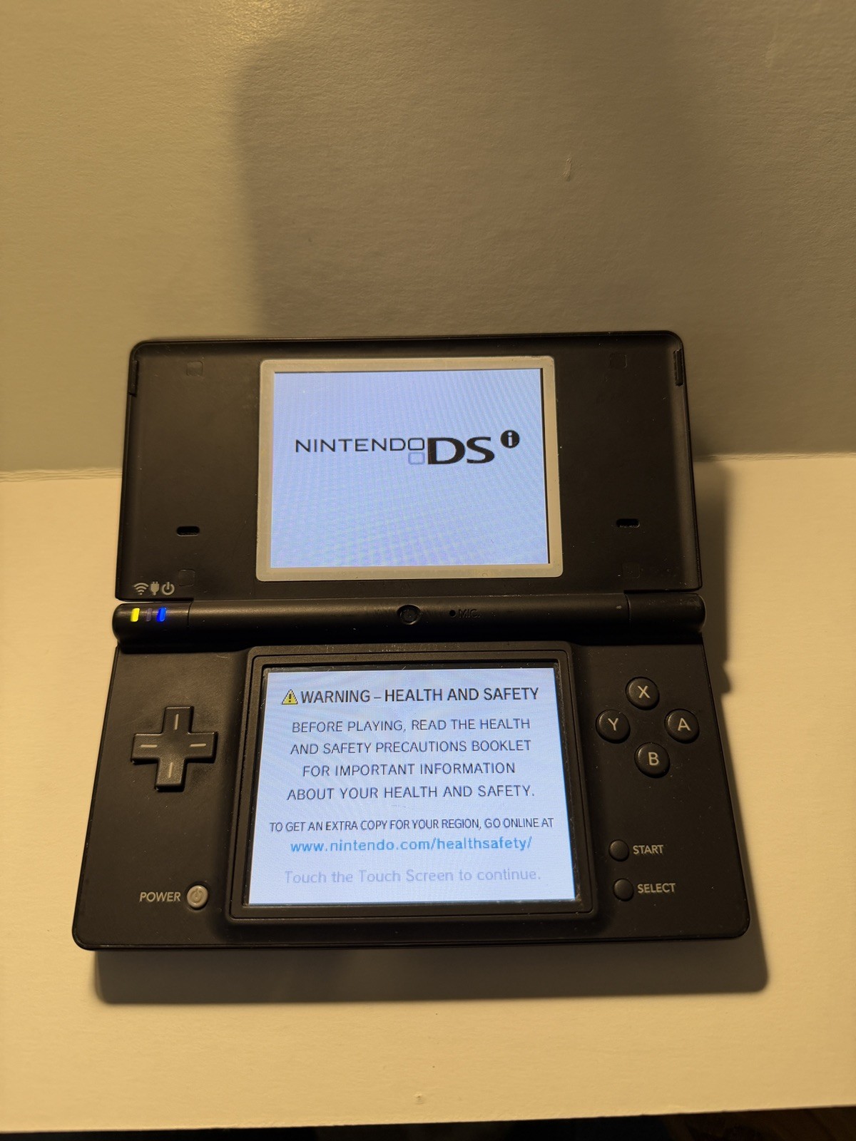 Tested Nintendo DSi Black System w/Charger Back R & L Buttons Do Not Work.