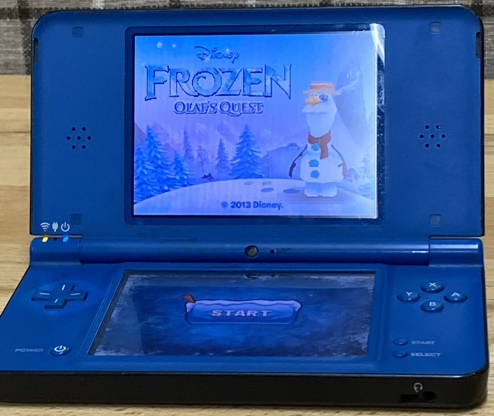 Nintendo DSi XL Handheld System – Midnight Blue With Charger And Frozen Game