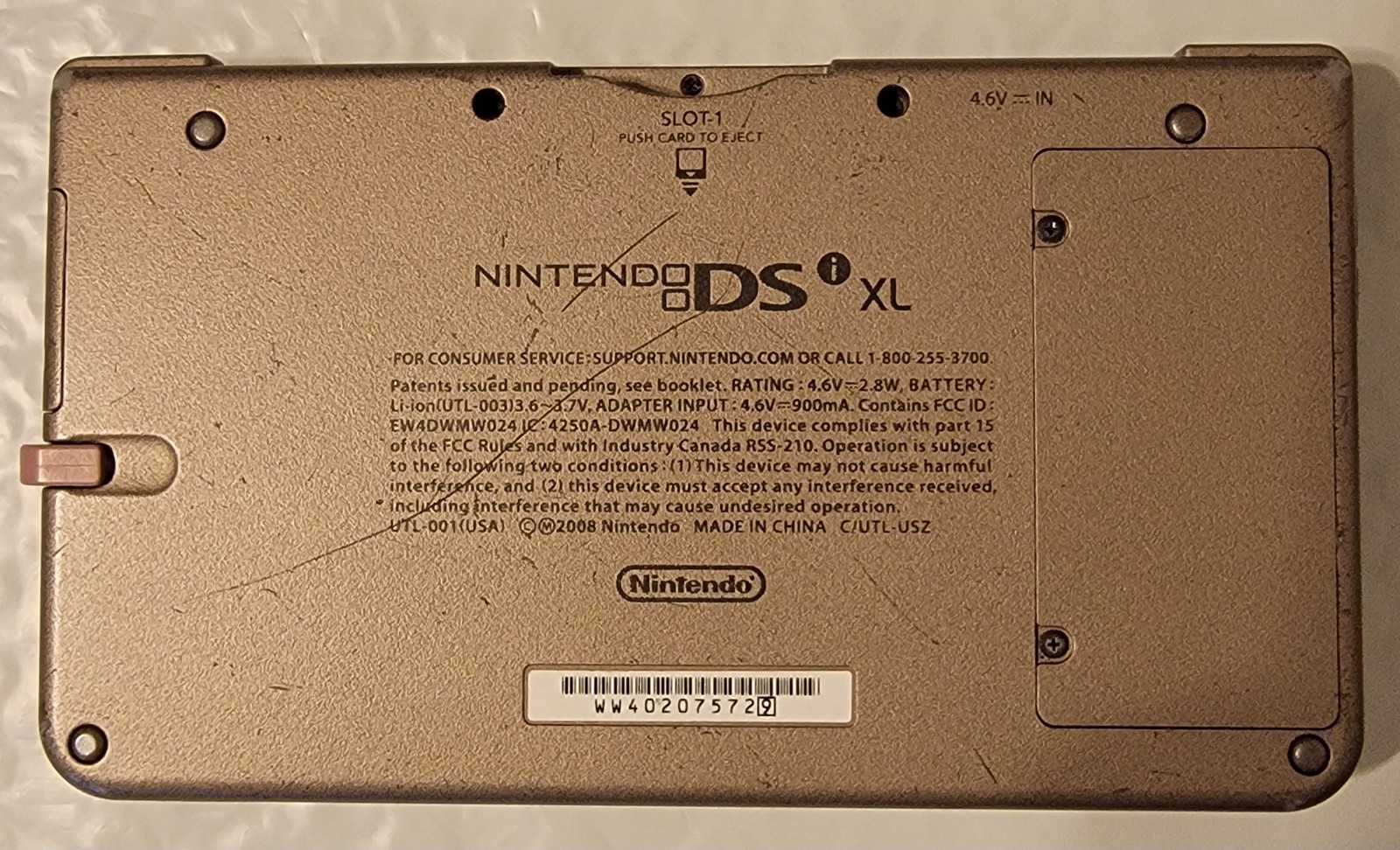 Nintendo DSi XL Bronze w/ Charger & 5 Games Mario 64 DS & New Super Mario Bros