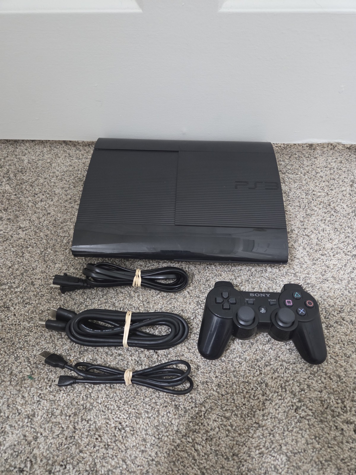 Sony PlayStation 3 Super Slim 256GB Console with Controller And Cables