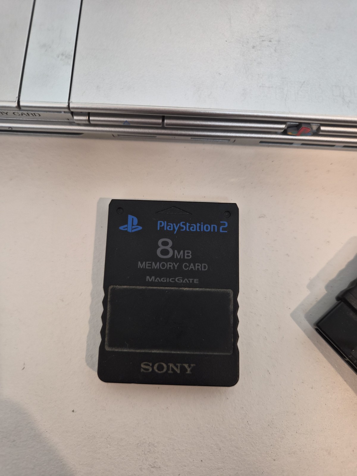 NEW LASER Silver PS2 Slim SCPH-77001 Bundle -NEW BATTERY – Cleaned 4 games Cords