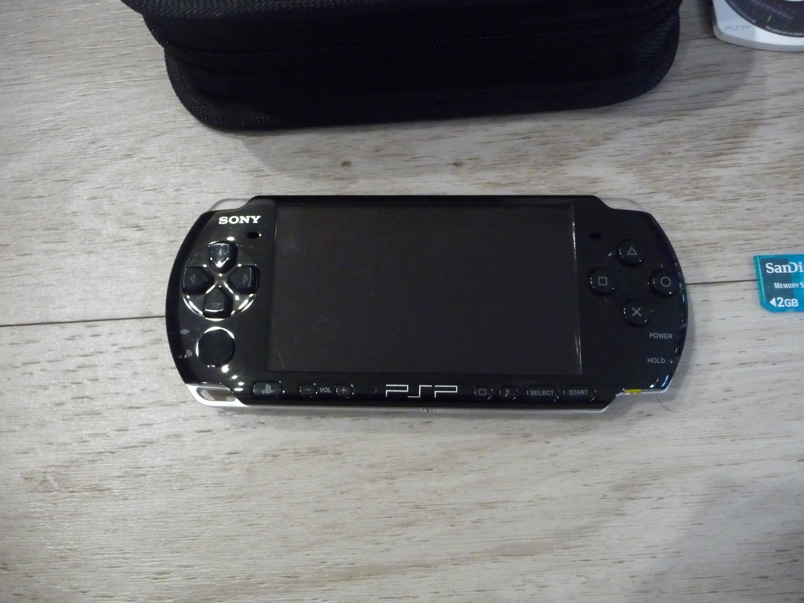 Sony Playstation Portable PSP-3001 With case and 3 games ,No battery or charger