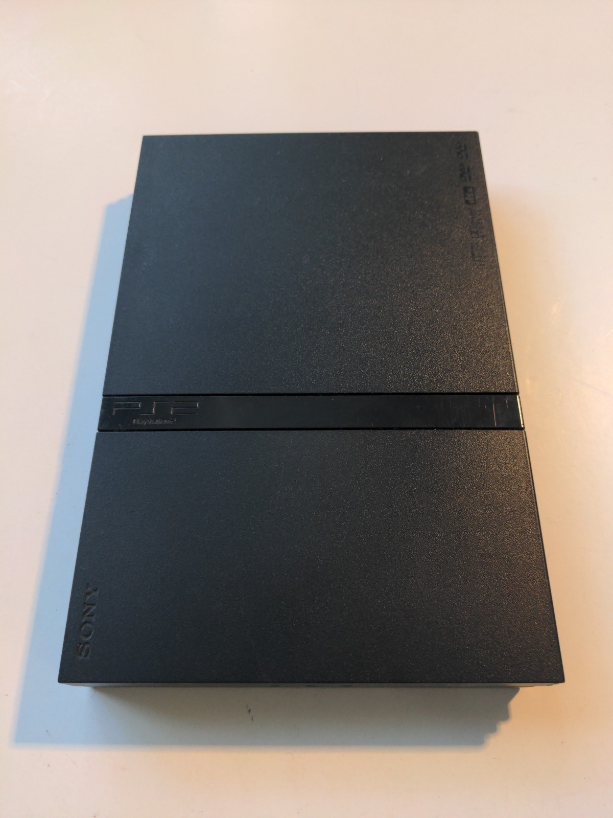 Sony Playstation 2 Slim SCPH-77001 READ DESC – PLAYS only PS1 Games & Blue Discs